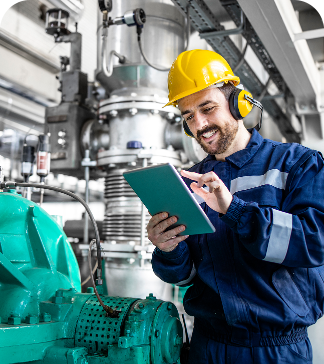 GettyImages-1146054915 (2) Engineer using tablet in industrial setting.